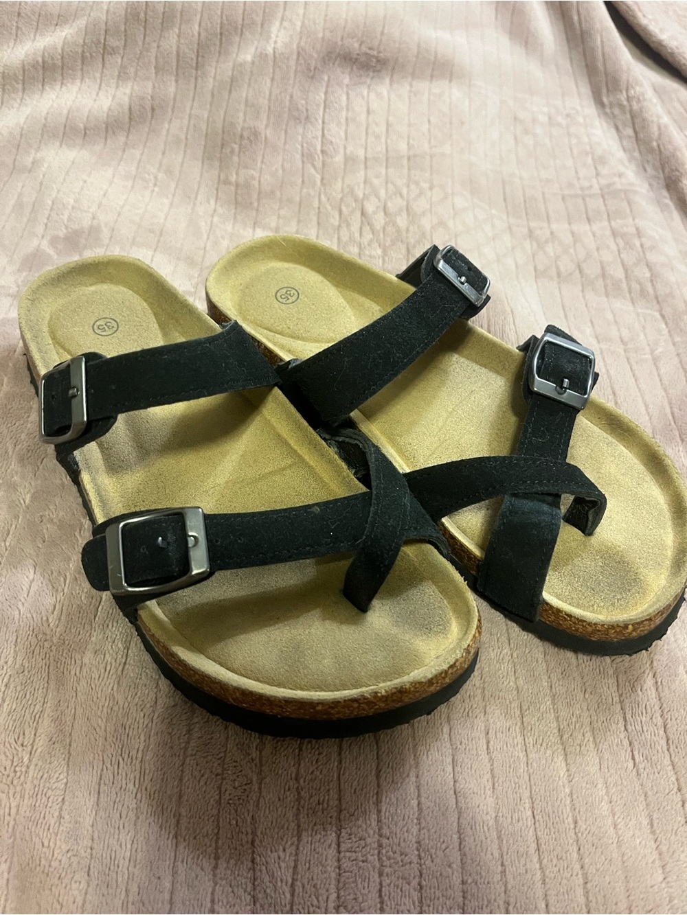 Brown and black sandals